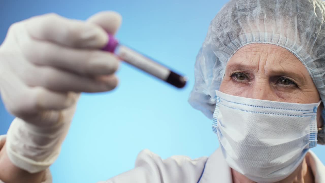 Stock Video Old Doctor Checking Positive Test For Covid Live Wallpaper - Free Download