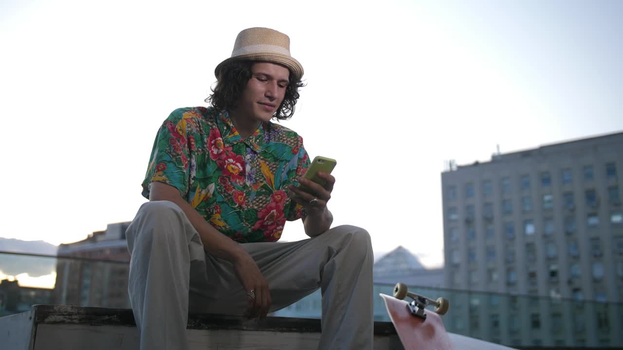 Free Video Stock Skater Using His Phone In The City Live Wallpaper - Free Download