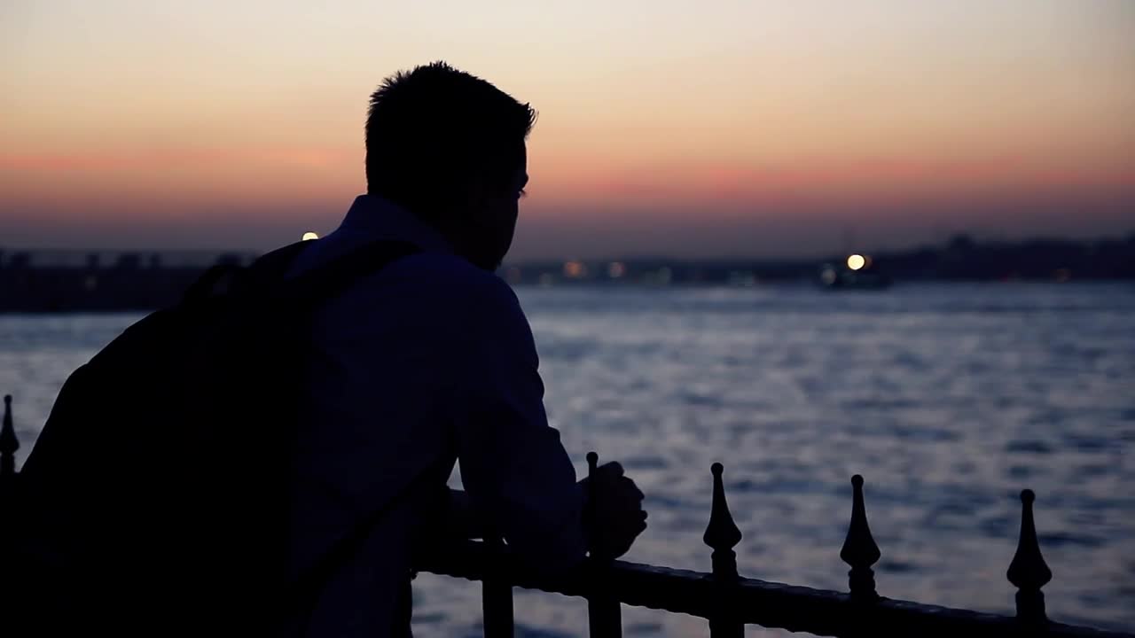 Free Stock Video Silhouette Of A Lonely Man At Dusk Near A River Live Wallpaper - Free Download