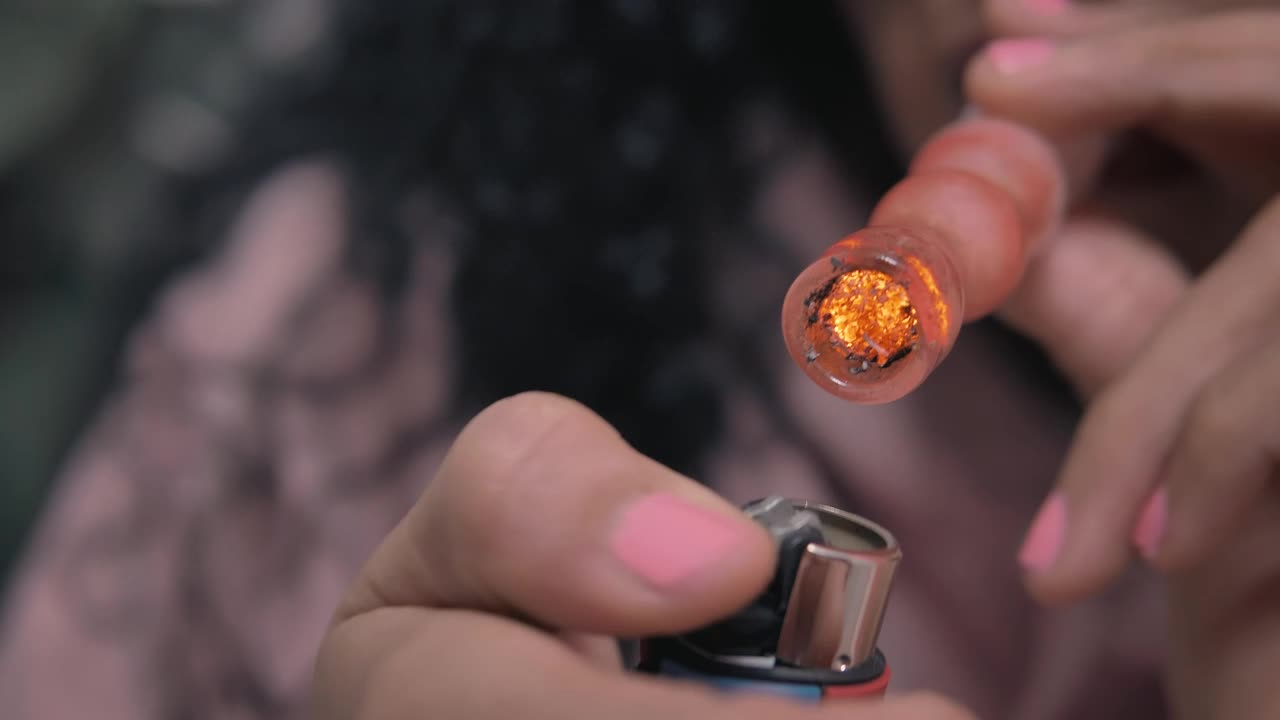 Free Stock Video Woman Smokes Marijuana With A Glass Pipe Live Wallpaper - Free Download