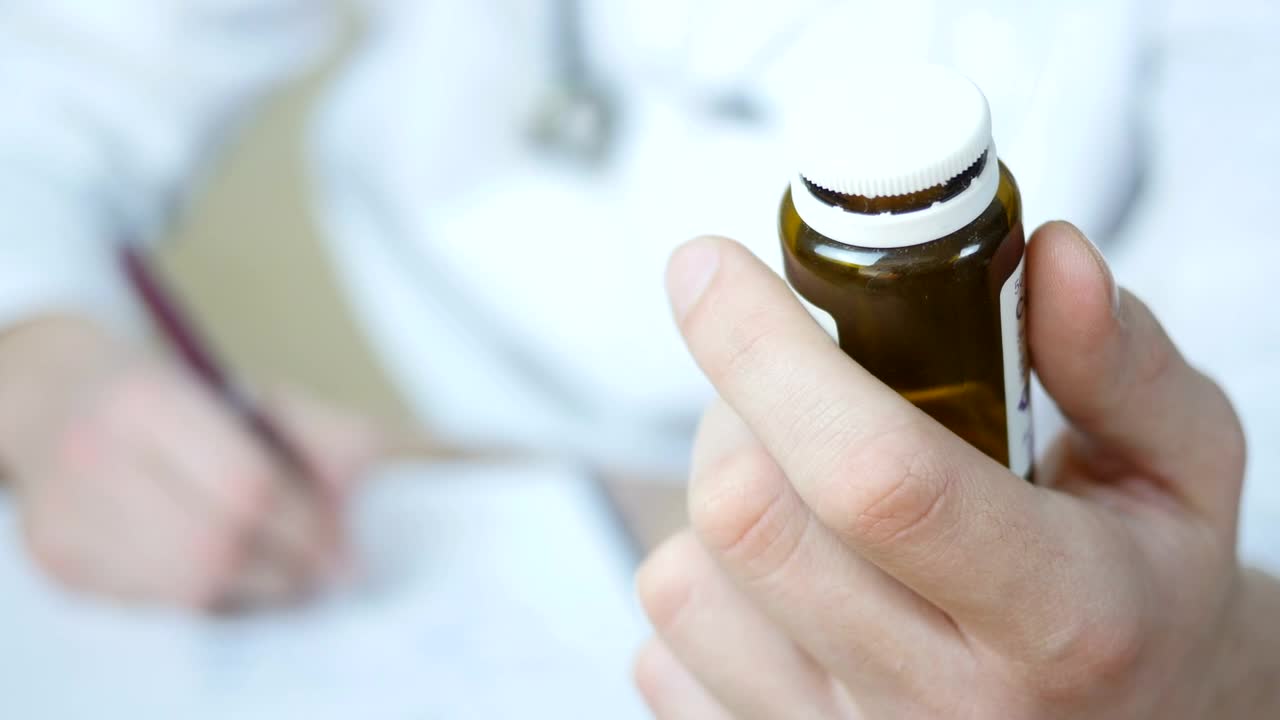 Stock Video Doctor With A Bottle Of Pills On The Hand Live Wallpaper For PC - Free Download