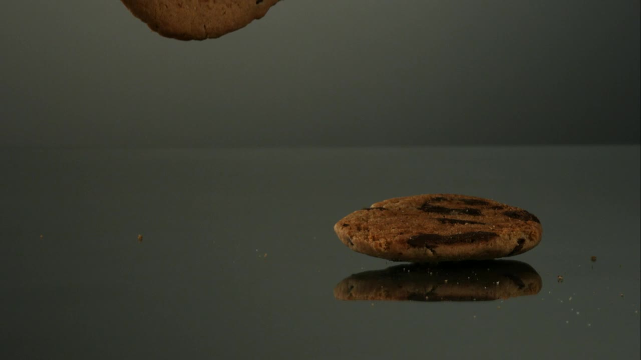 Stock Video Cookies Falling In Slow Motion To Mirror Surface Live Wallpaper For PC - Free Download
