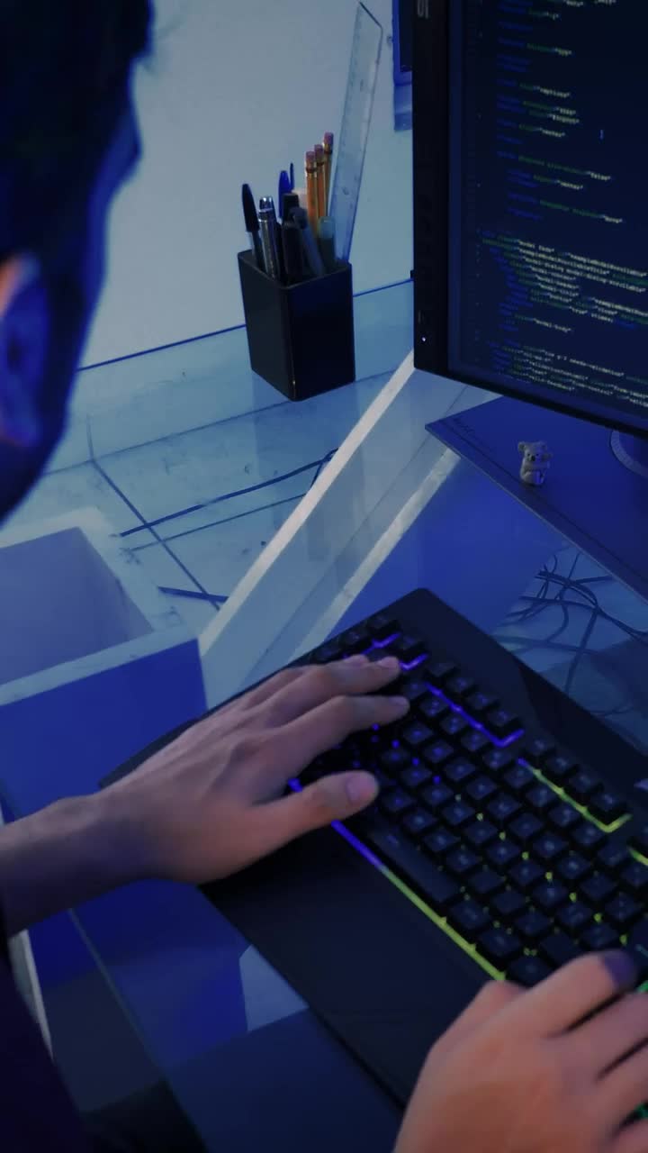 Stock Video Experienced Programmer Working On A Powerful Computer Live Wallpaper For PC - Free Download