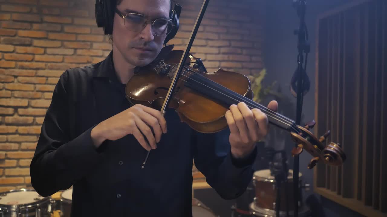 Stock Video Male Violinist Recording In A Studio Animated Wallpaper - Free Download