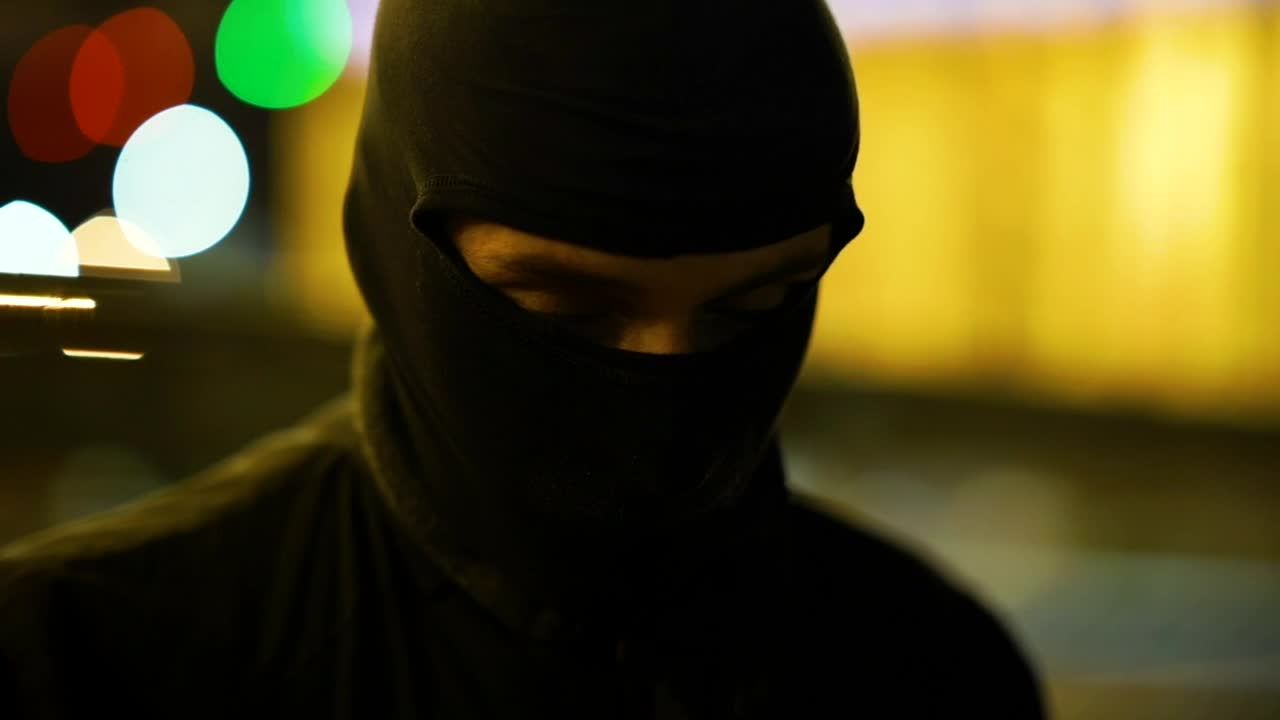Stock Video Gangster With Face Cover Looking At The Camera Live Wallpaper For PC - Free Download