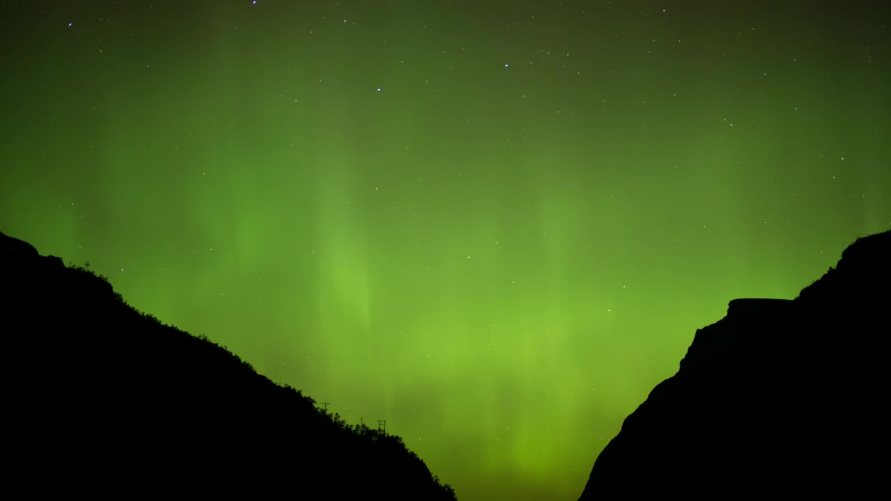 Stock Video Northern Lights Behind Two Mountains Live Wallpaper - Free Download