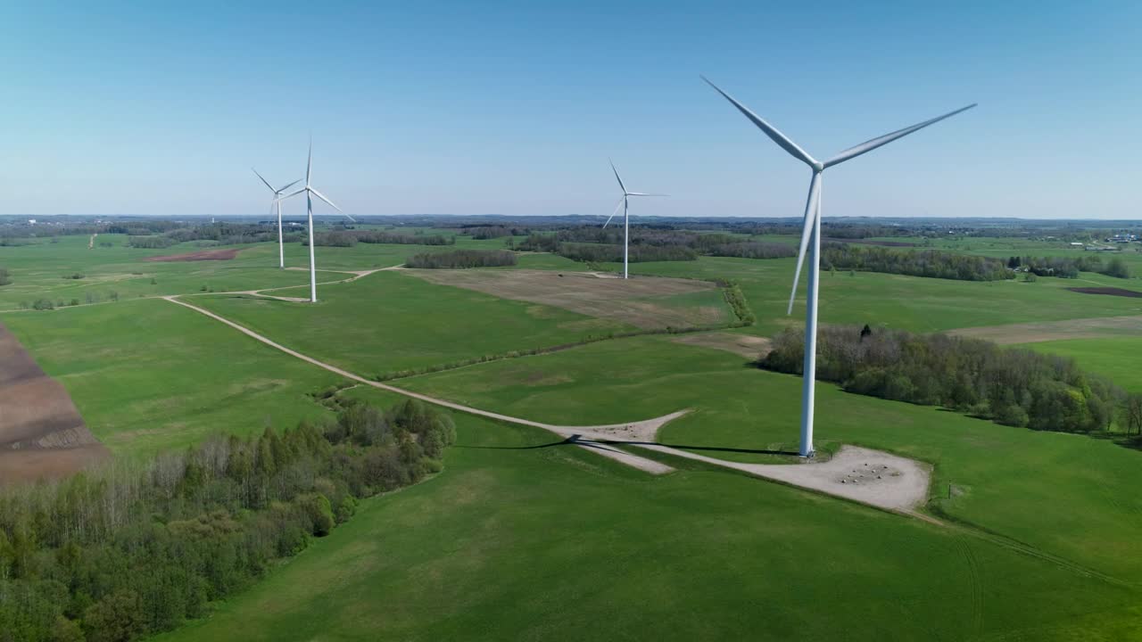 Stock Footage Wind Turbines On A Green Field Live Wallpaper - Free Download