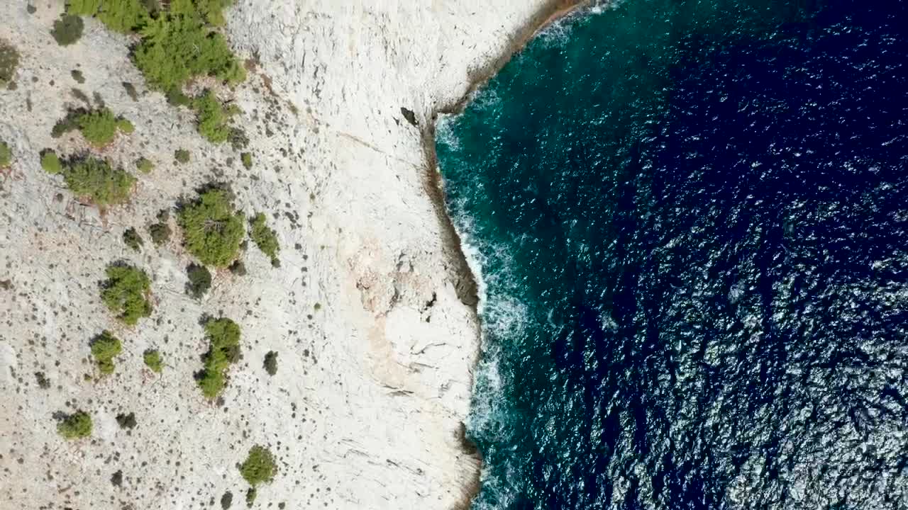 Stock Video Deep Blue Water Along Dusty Cliffs Live Wallpaper For PC - Free Download