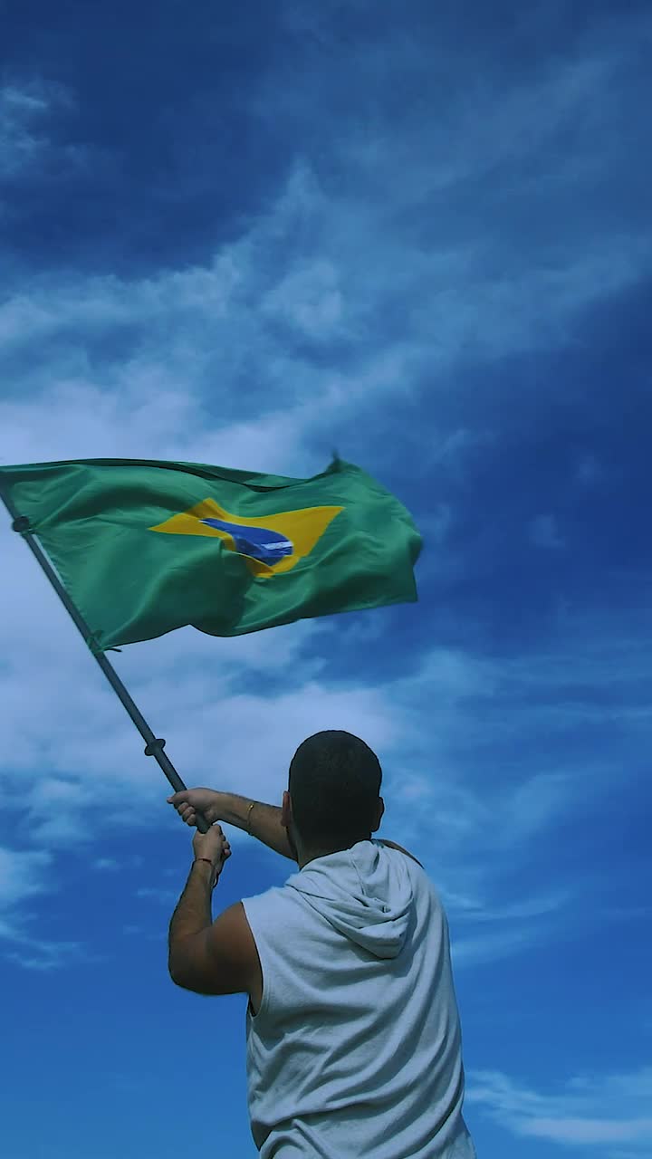 Stock Video Man Waving The Flag Of Brazil In Slow Motio Animated Wallpaper - Free Download