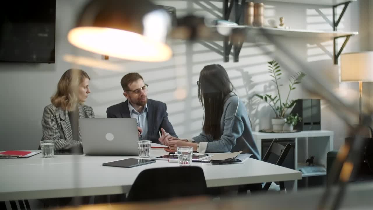 Stock Video Lawyers Talk With Client In Late Evening Office Animated Wallpaper - Free Download
