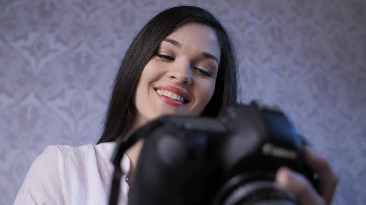 Stock Video Excited And Happy Woman Watching Photos Live Wallpaper For PC - Free Download