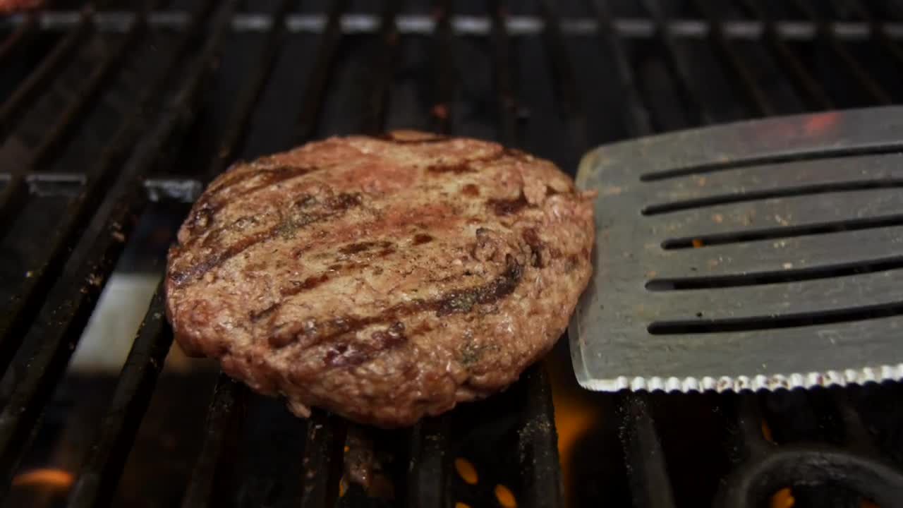 Stock Video Flipping A Burger On A Bbq Live Wallpaper For PC - Free Download