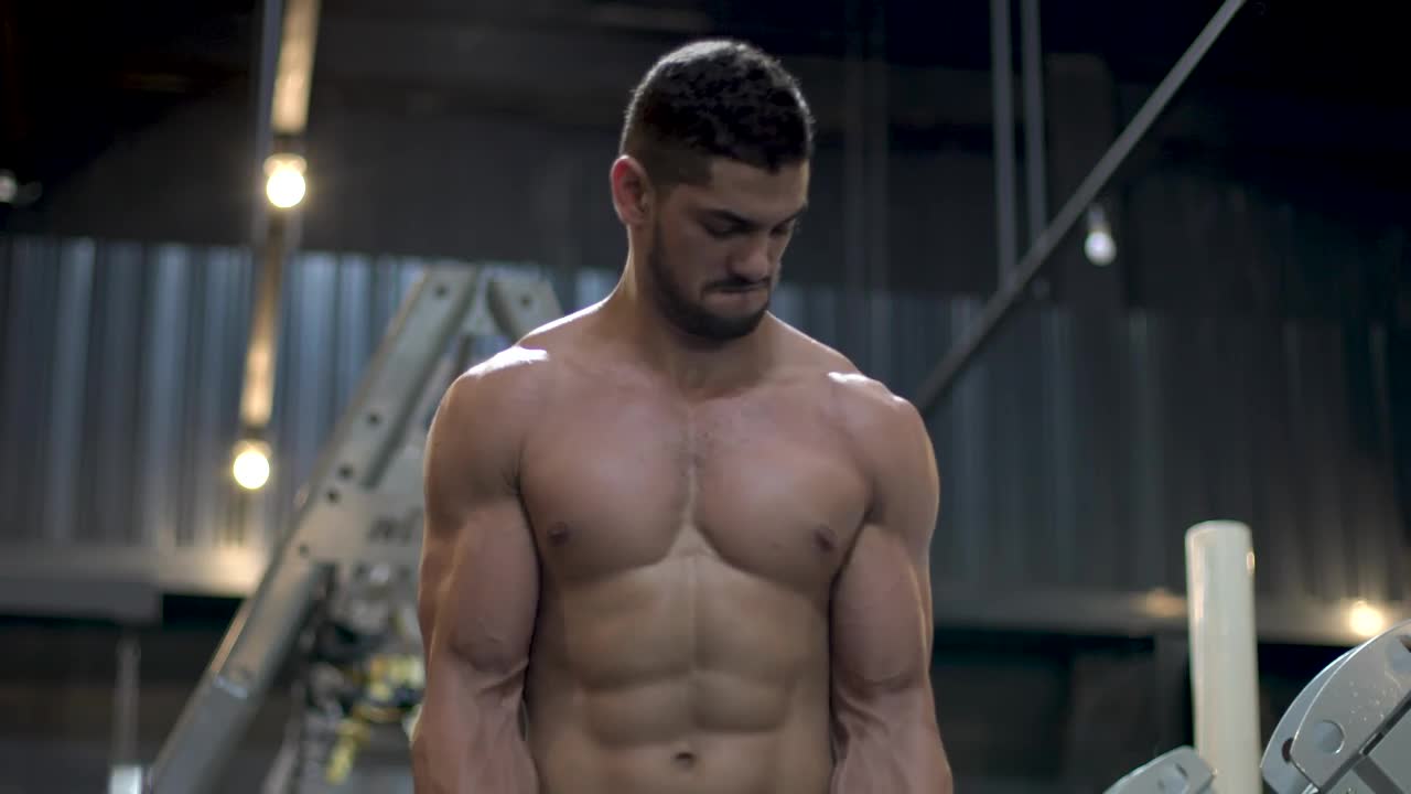 Stock Video Muscular Man Working Out With A Dumbbell Live Wallpaper - Free Download