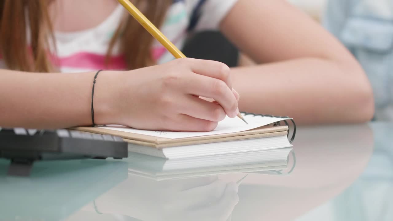 Stock Video Girl Writes Notes While Learning In Classroom Live Wallpaper For PC - Free Download