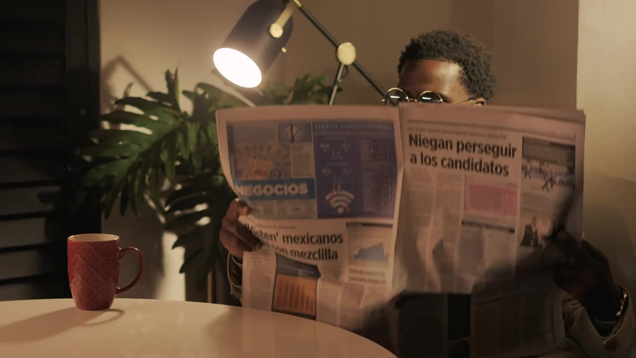 Stock Video Intellectual Man Reading The Newspaper With A Cup Of Coffee 4119 Animated Wallpaper - Free Download