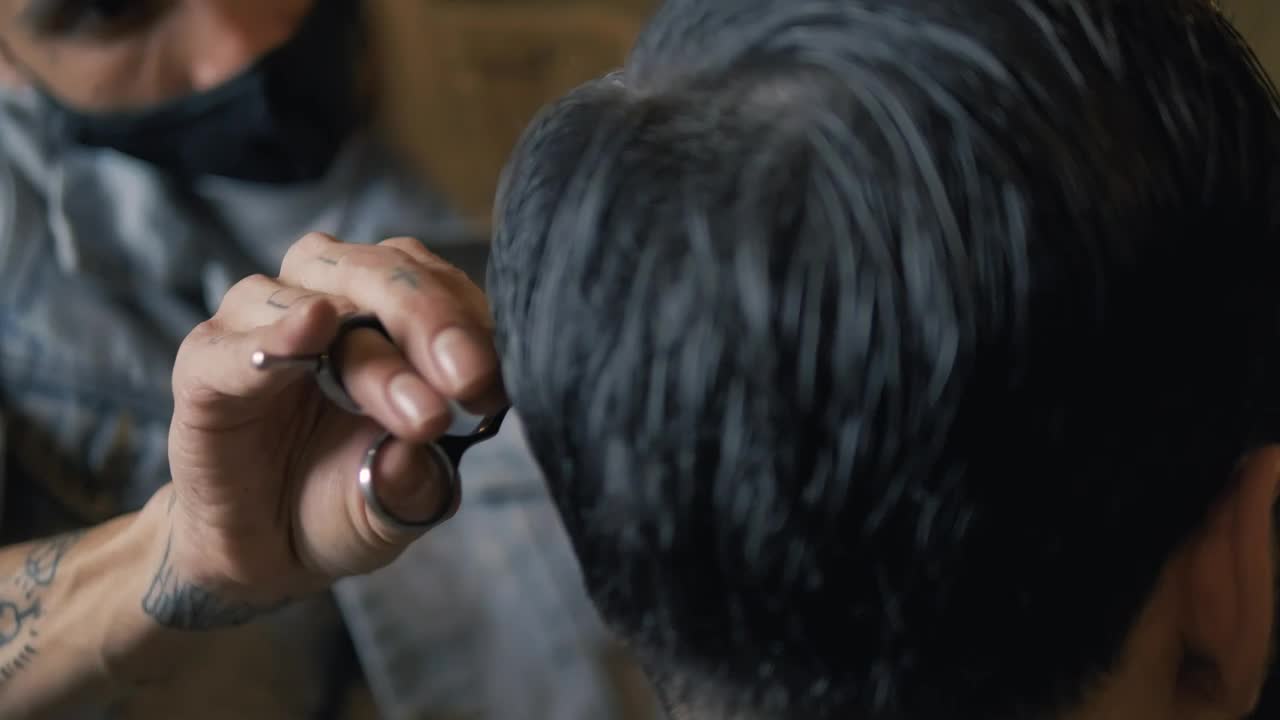 Stock Video Hairdresser With A Mask Cutting A Persons Hair Live Wallpaper For PC - Free Download