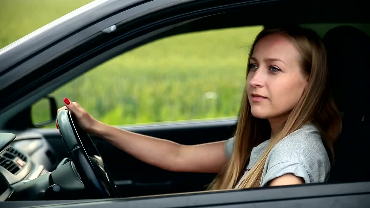 Free Stock Video Woman In Her Car Asking For Directions With A Map Live Wallpaper - Free Download