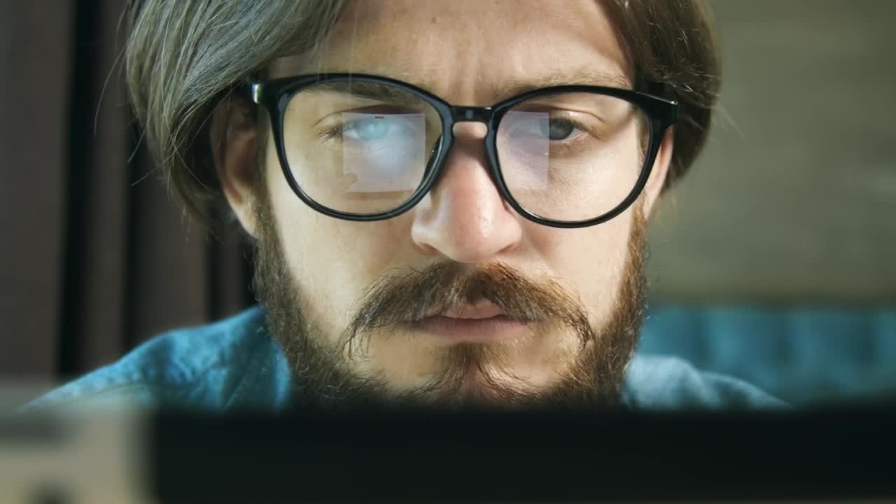 Stock Video Man Typing On Laptop Reflected In Glasse Animated Wallpaper - Free Download