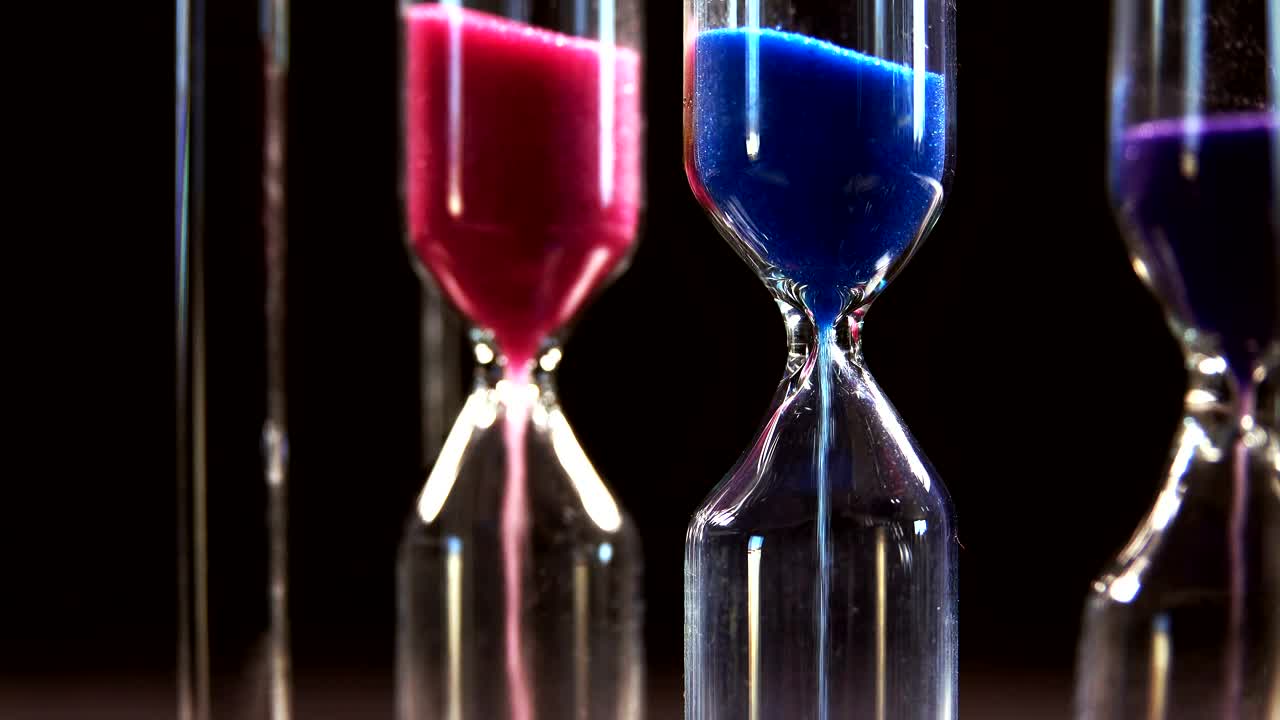 Stock Video Hourglasses On Black Background Close Up Animated Wallpaper - Free Download