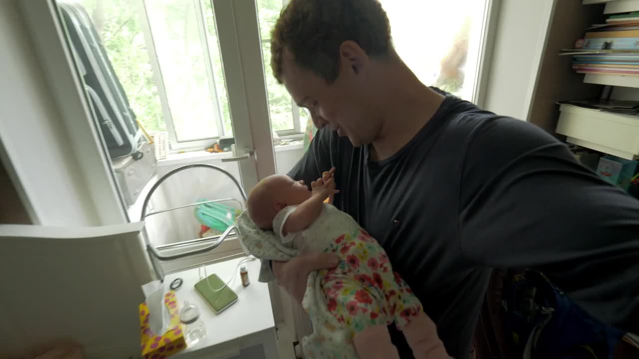 Stock Video Father Caring For His Newborn Baby Live Wallpaper For PC - Free Download