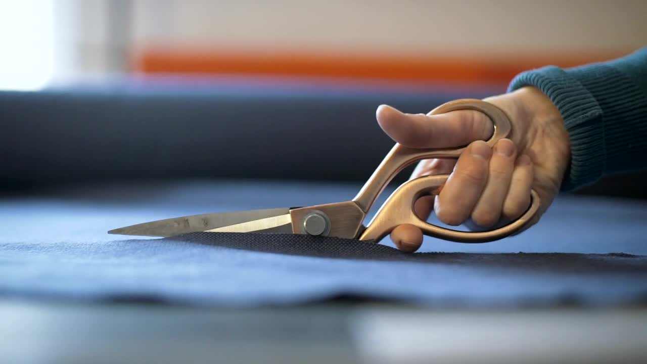 Free Stock Video Scissors Cutting A Blue Fabric Live Wallpaper - Free Download