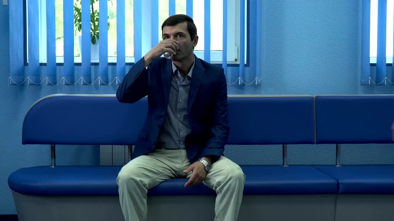 Stock Video People Sitting In A Hospital Waiting Room Live Wallpaper - Free Download