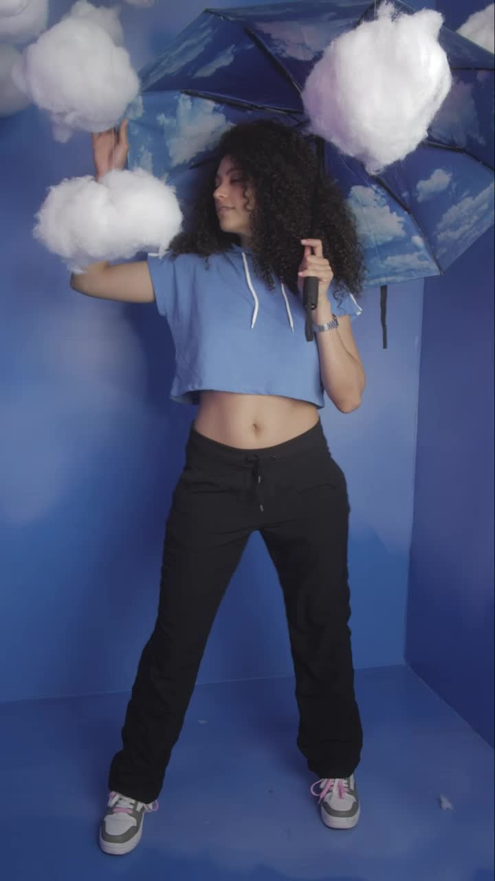 Stock Video Girl With An Umbrella Among Cotton Clouds Live Wallpaper For PC - Free Download