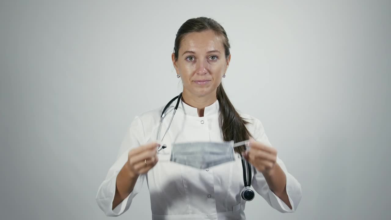 Stock Video Doctor Puts On Medical Mask Live Wallpaper For PC - Free Download