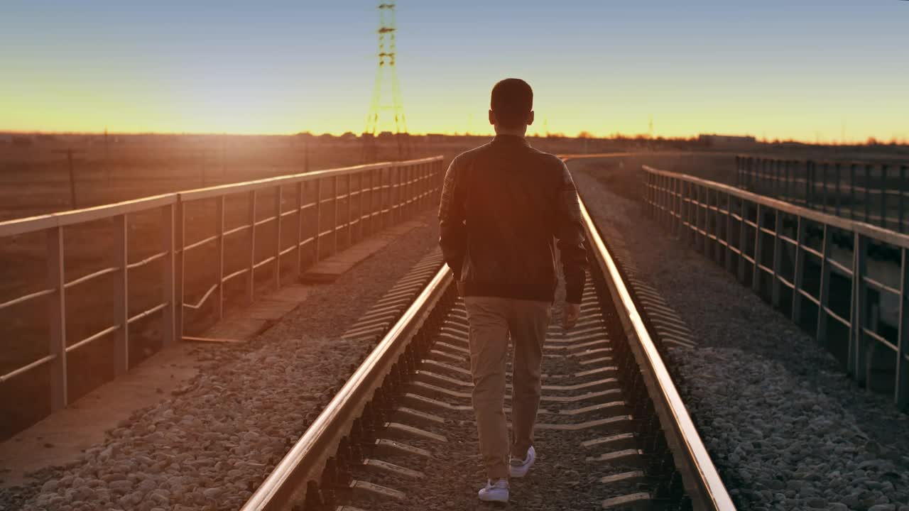 Free Stock Video Urban Man Walking On The Train Tracks Live Wallpaper - Free Download