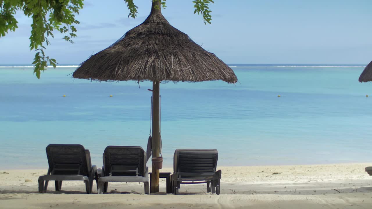 Stock Video Empty Wooden Chairs On A Tropical Beach Live Wallpaper For PC - Free Download