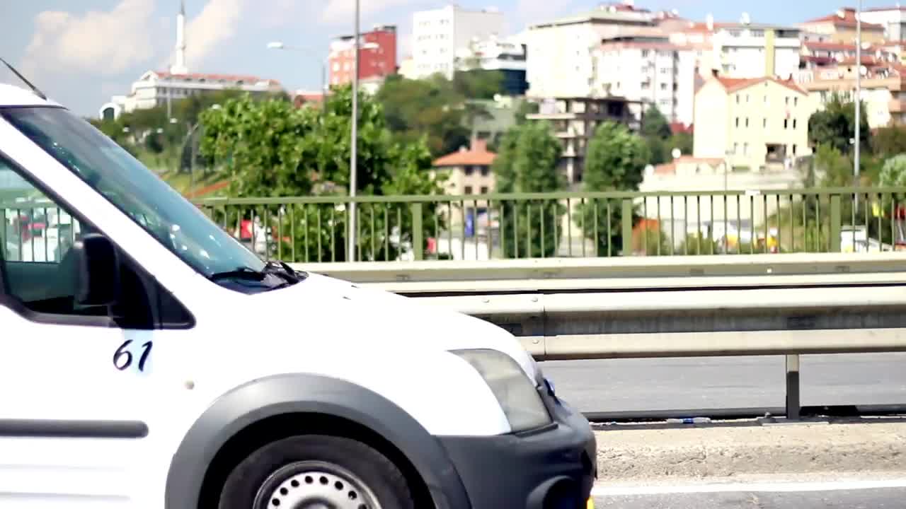 Video Stock Cars Passing In Front Of A City Avenue Live Wallpaper For PC - Free Download