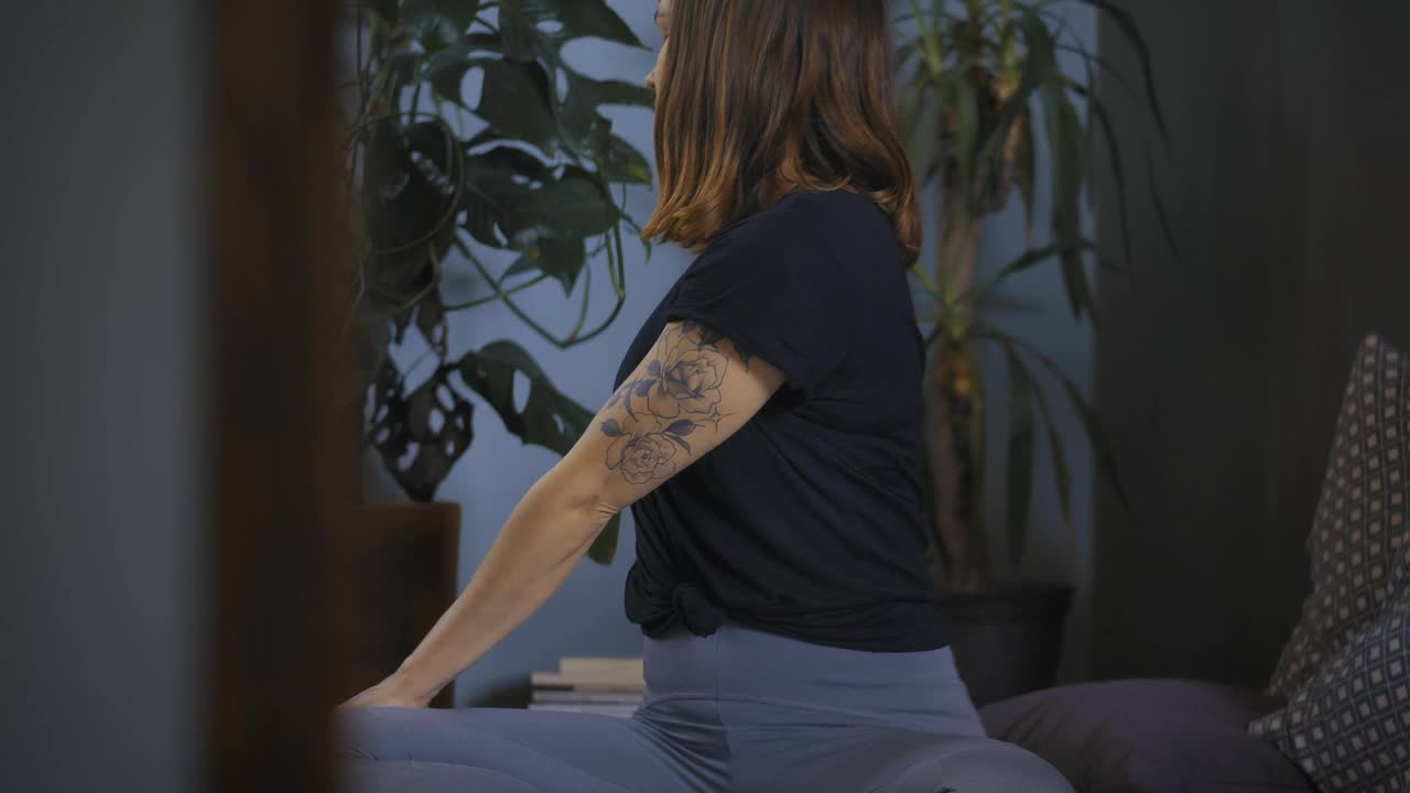 Free Stock Video Young Woman Stretching Her Body Sitting On The Floor At Live Wallpaper - Free Download