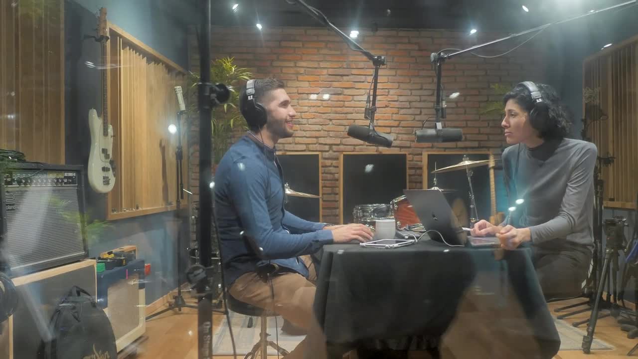 Stock Video Couple Of Broadcasters Recording Live Wallpaper For PC - Free Download