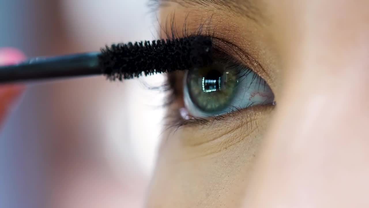 Stock Footage Woman Applying Mascara In Her Eyes Live Wallpaper - Free Download