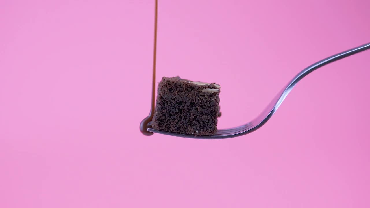 Stock Video Covering A Piece Of Brownie With Chocolate Live Wallpaper For PC - Free Download