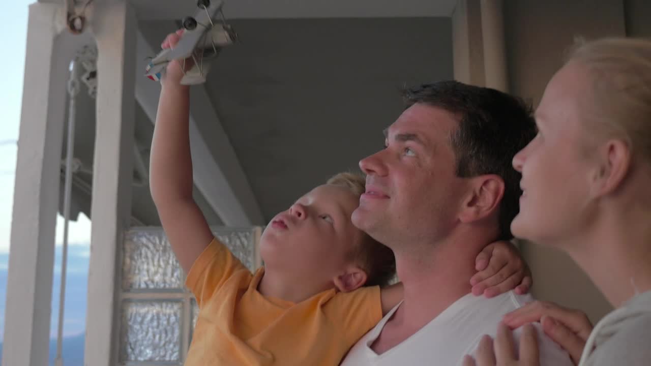 Stock Video Family Standing On A Hotel Balcony Live Wallpaper For PC - Free Download