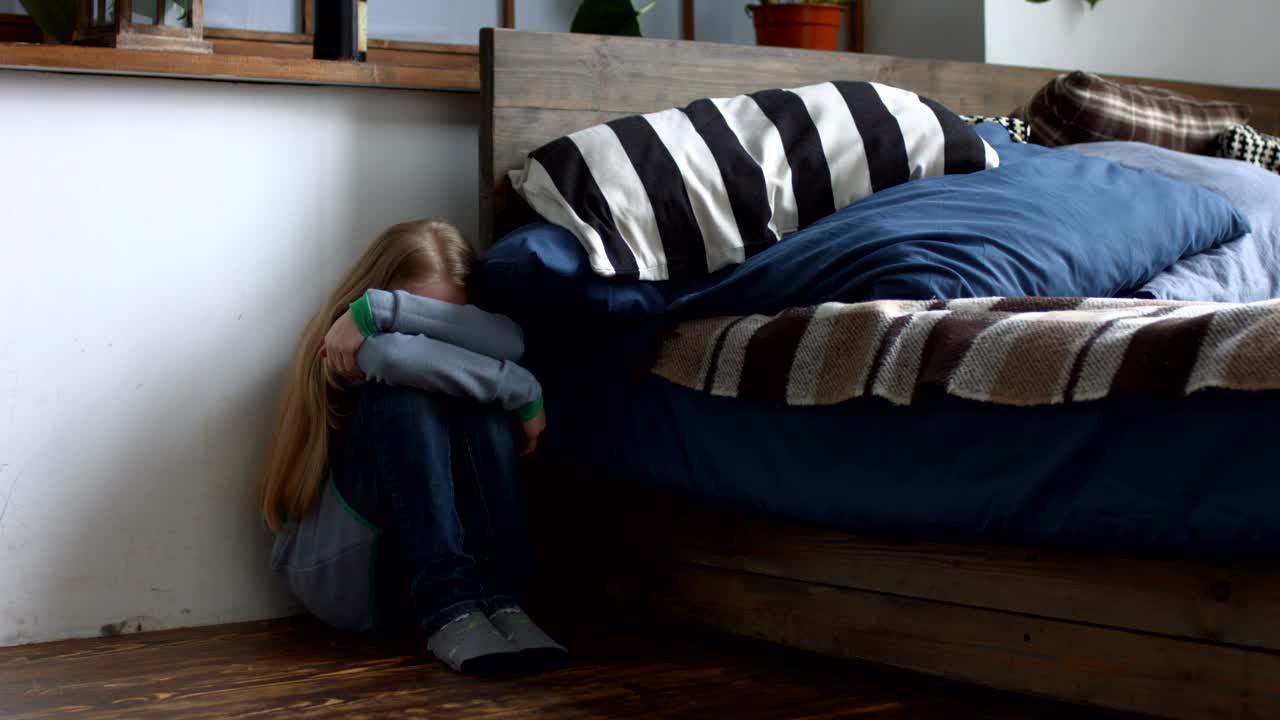 Stock Video Frightened Girl Hiding Beside A Bed Live Wallpaper For PC - Free Download