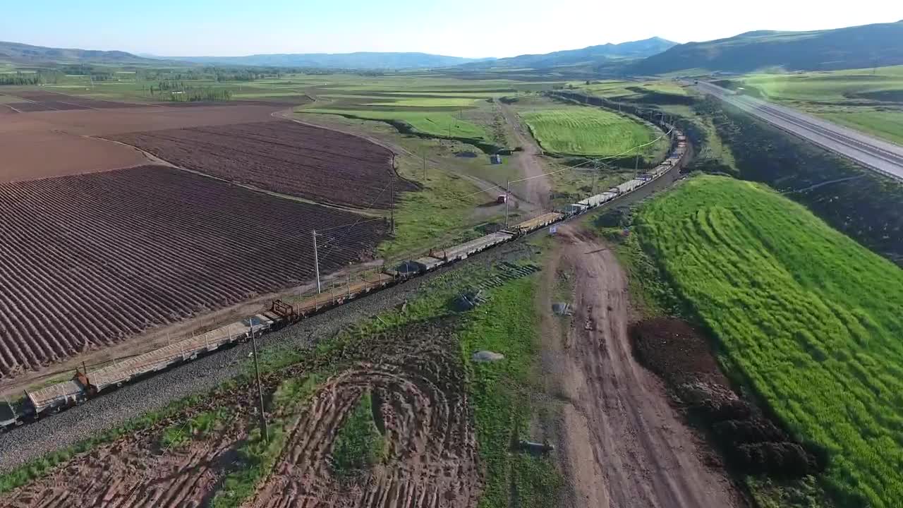 Stock Video Freight Train Moving Through Agricultural Fields Live Wallpaper For PC - Free Download