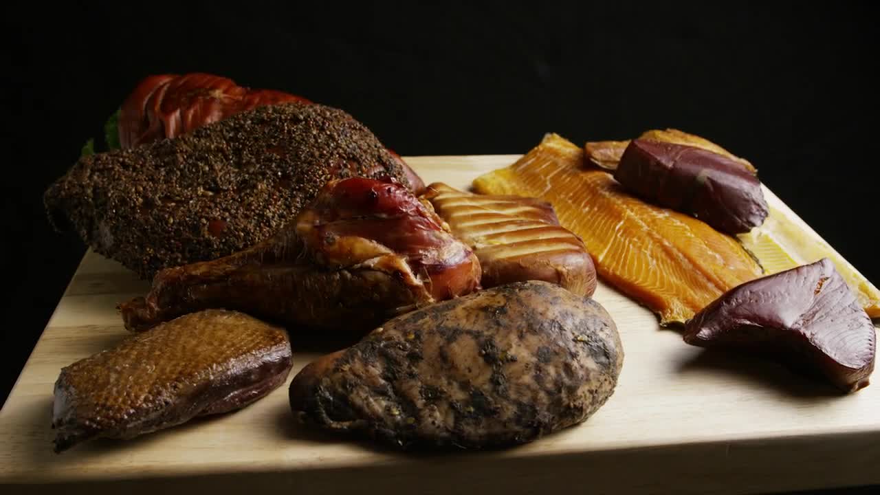 Stock Video Different Types Of Meat Rotating On A Wooden Board Live Wallpaper For PC - Free Download