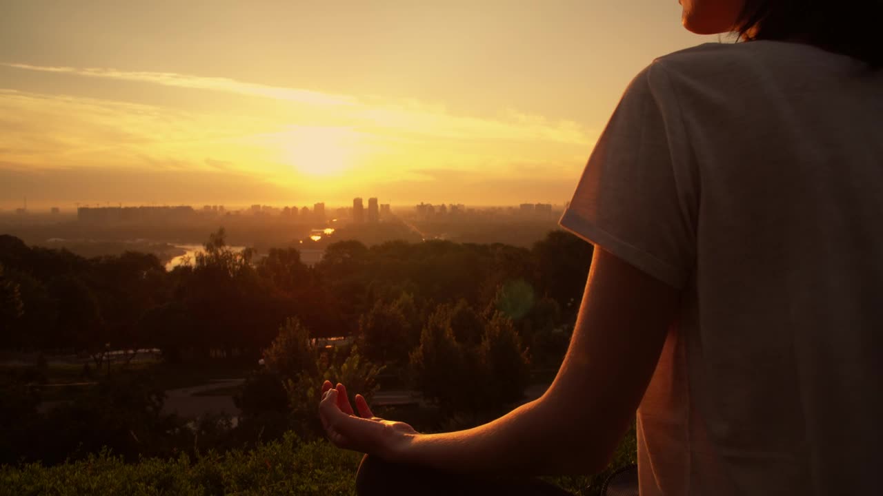 Stock Video Girl Meditating In Yoga Pose At Sunset Live Wallpaper For PC - Free Download