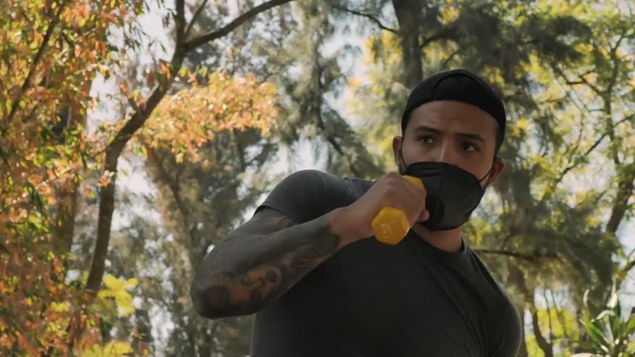 Stock Video Man At Boxing Training With Dumbbells Animated Wallpaper - Free Download