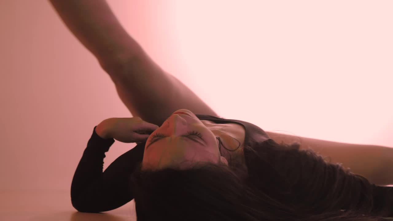 Stock Video Dancer Moving Her Body Lying On The Floor Live Wallpaper For PC - Free Download