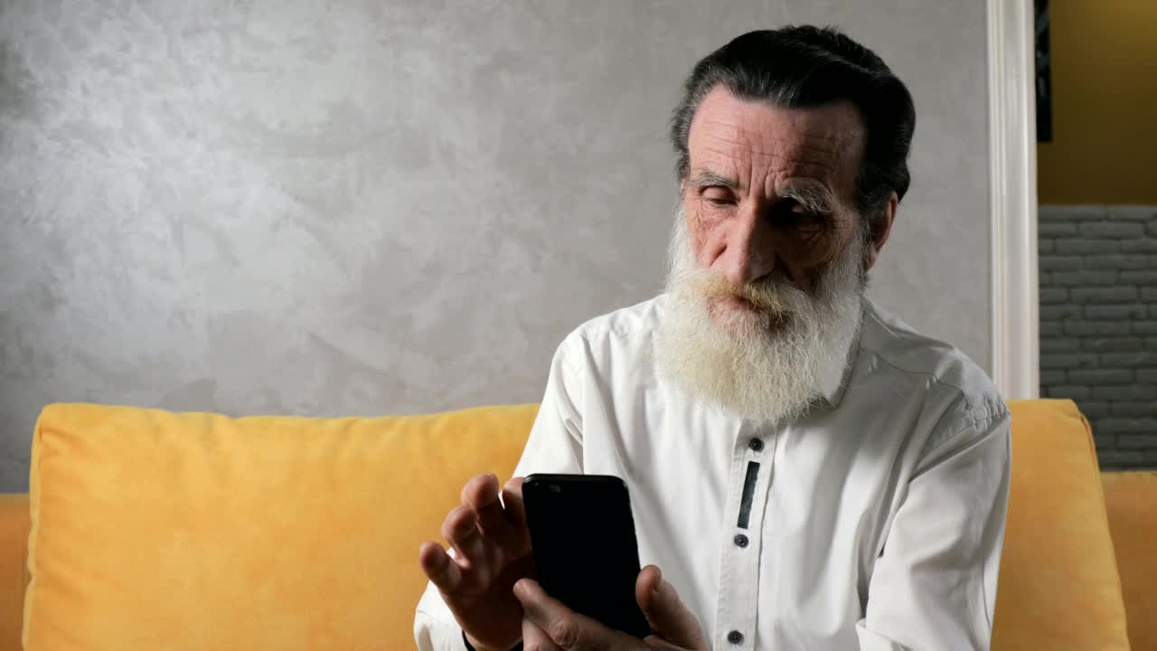 Stock Video Old Man Taking Successfully Takes Selfie With Mobile Phone Live Wallpaper - Free Download