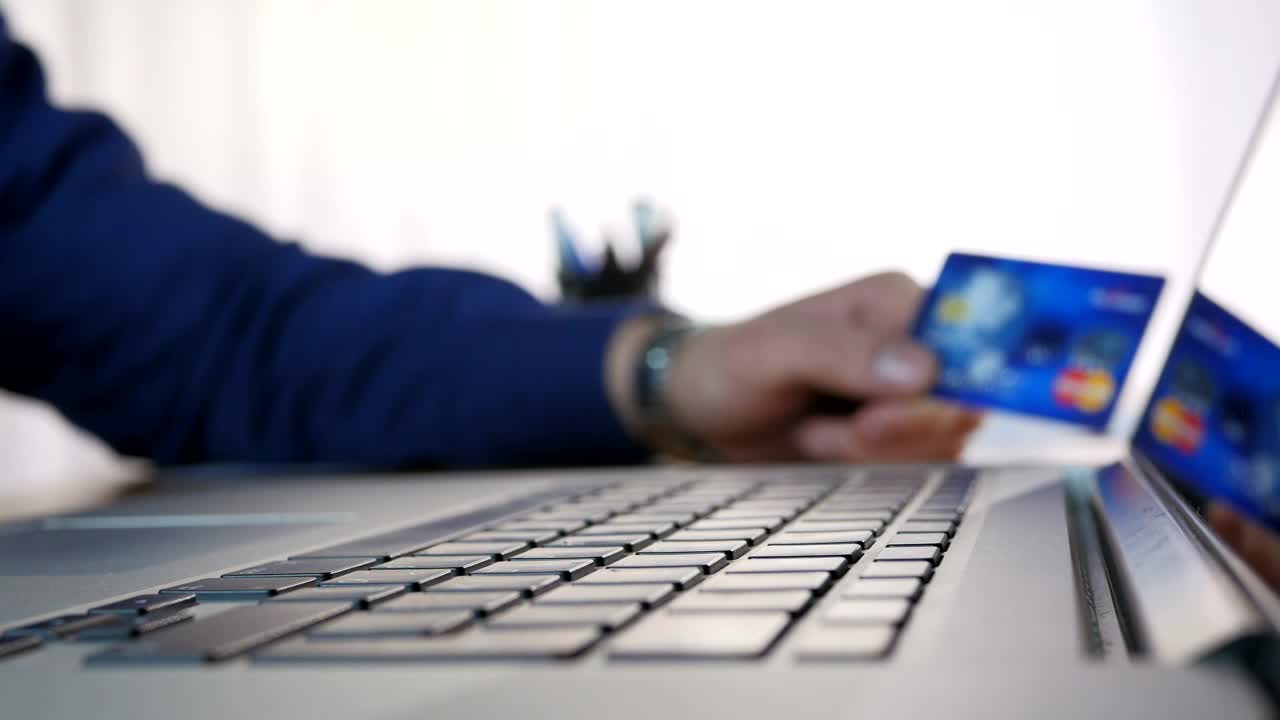 Stock Video Entering Bank Details On A Computer Live Wallpaper For PC - Free Download