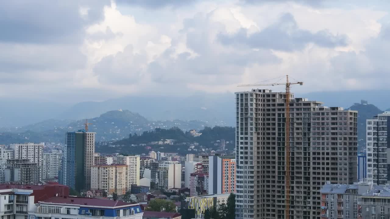 Free Video Stock time lapse of a tower crane in a construction site Live Wallpaper - Free Download