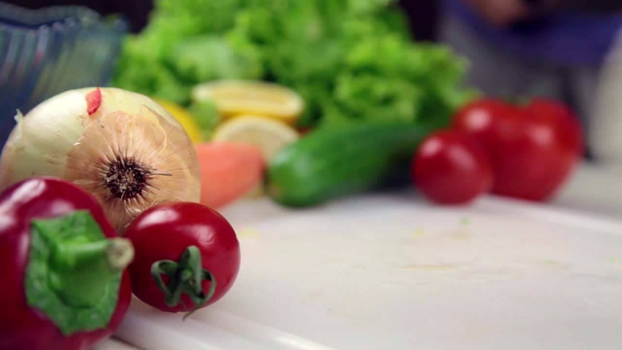 Video Stock Person Slicing Cheese At A Table With Vegetables Live Wallpaper Free - Free Download