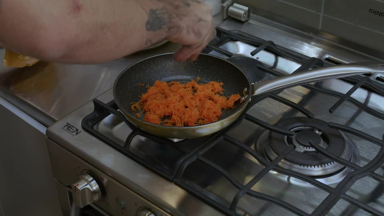 Stock Video Cook Preparing Something In A Pan Live Wallpaper For PC - Free Download