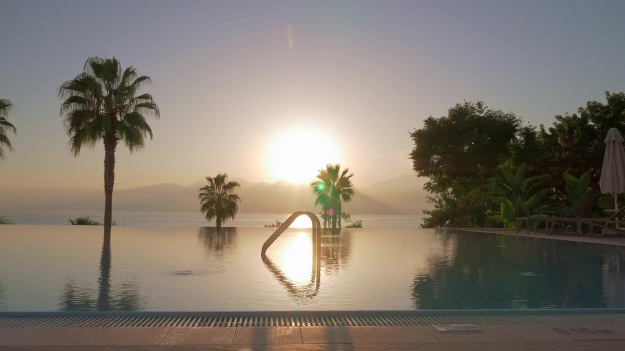 Free Video Stock sunshine and ripples on an infinity pool Live Wallpaper - Free Download