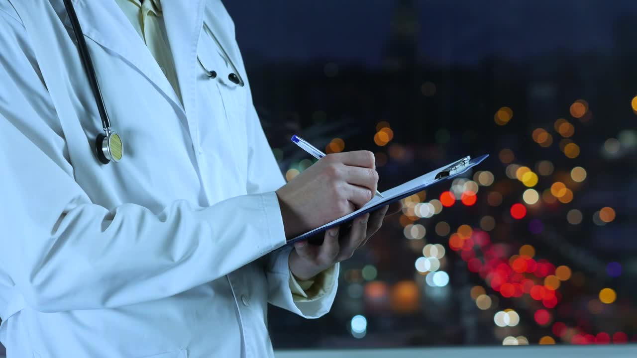 Stock Video Doctor Writing A Prescription With An Unfocused Street Background Live Wallpaper For PC - Free Download