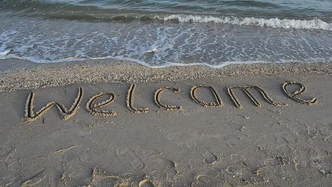 Stock Footage Welcome In The Sand At The Seashore Live Wallpaper - Free Download